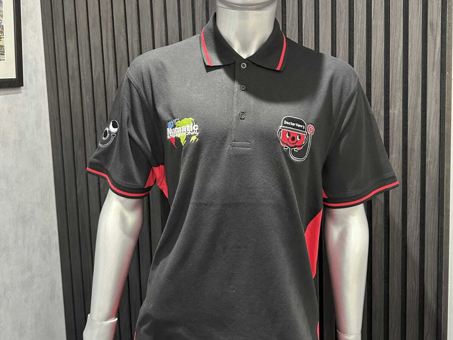 A high-quality logo embroidery has been done on a polo shirt.