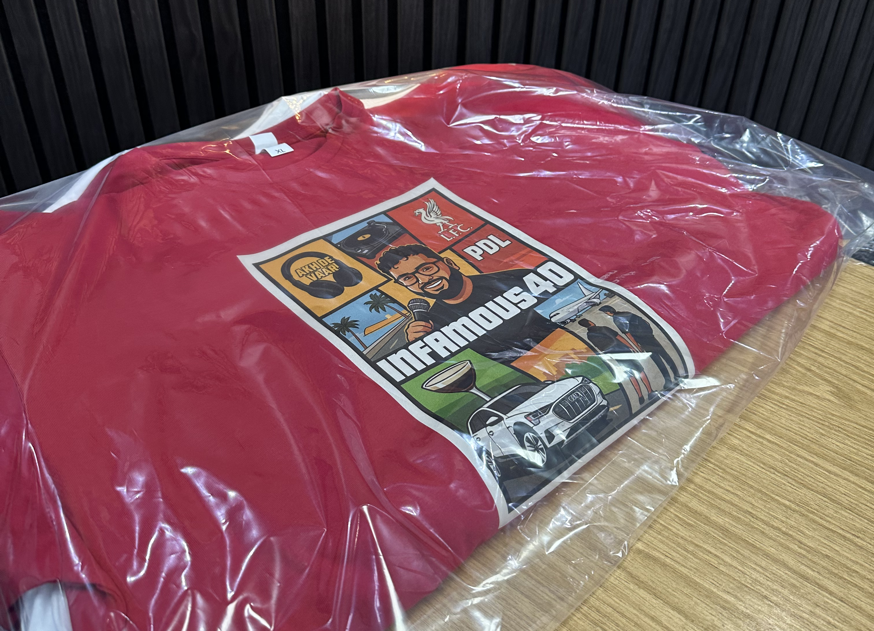 A custom DTF Gang Sheet has been used to created the pattern on a red t-shirt. 